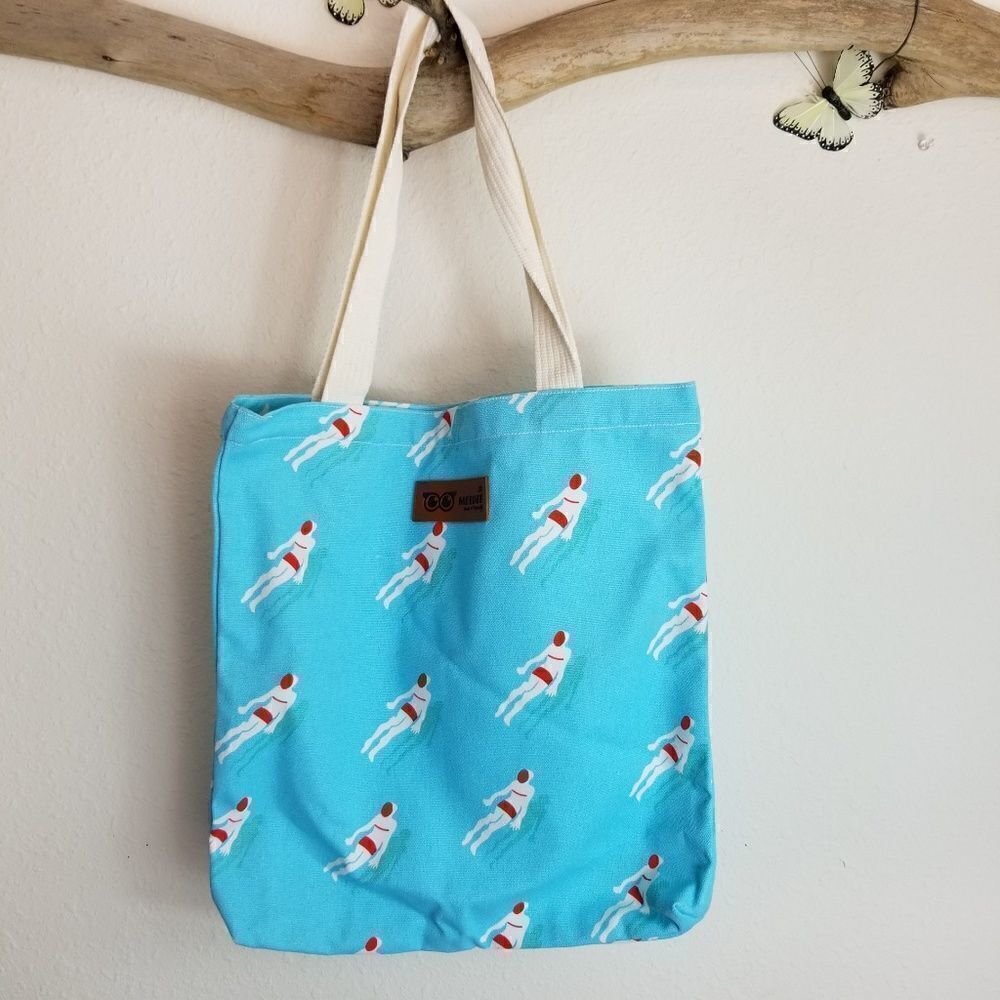 Blue tote bag with vintage swimmer print